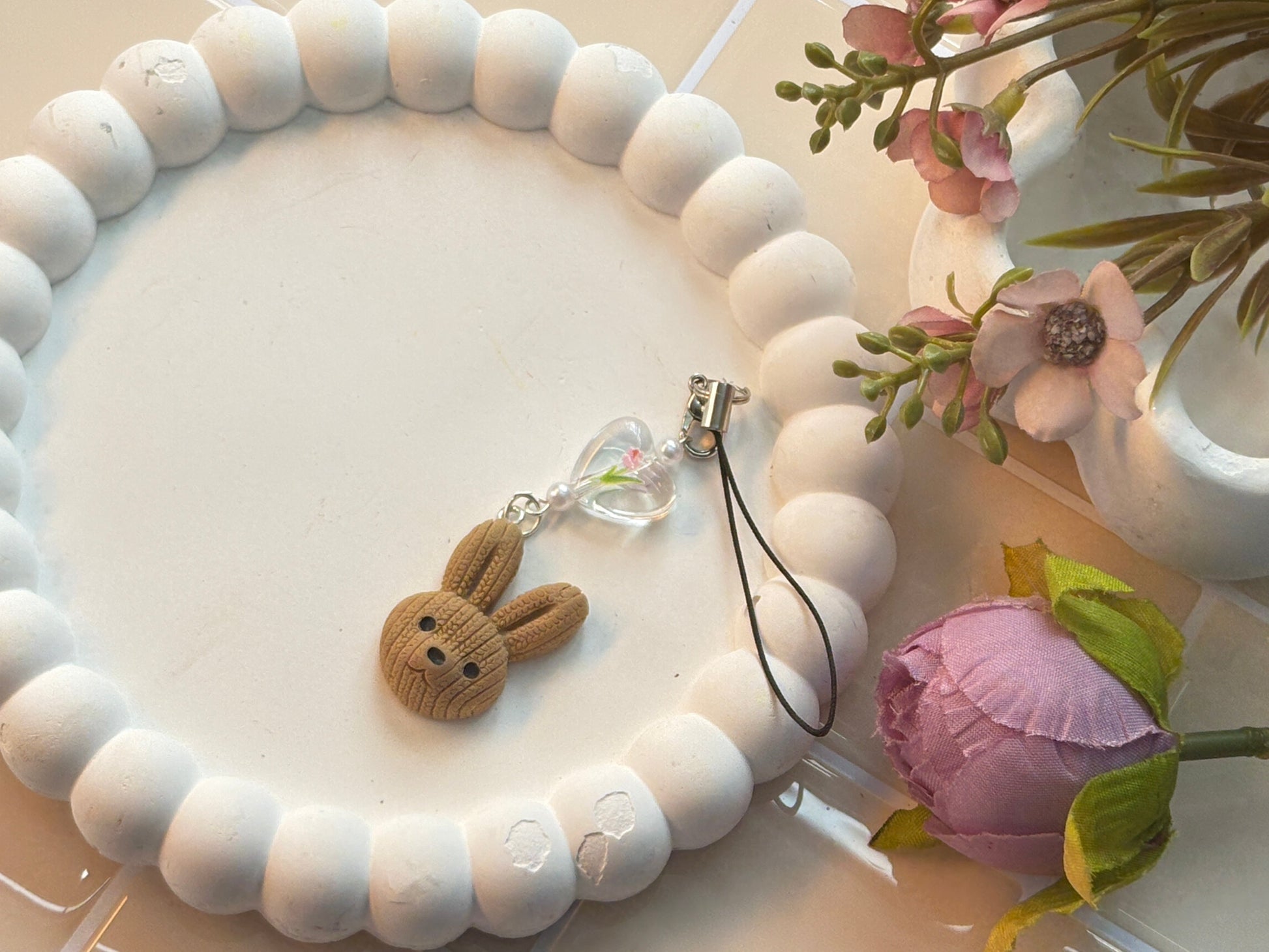 Knitted Bunny Head Charm with Floral Heart Bead | Cozy Textured Rabbit Design | Warm Kawaii Phone Strap